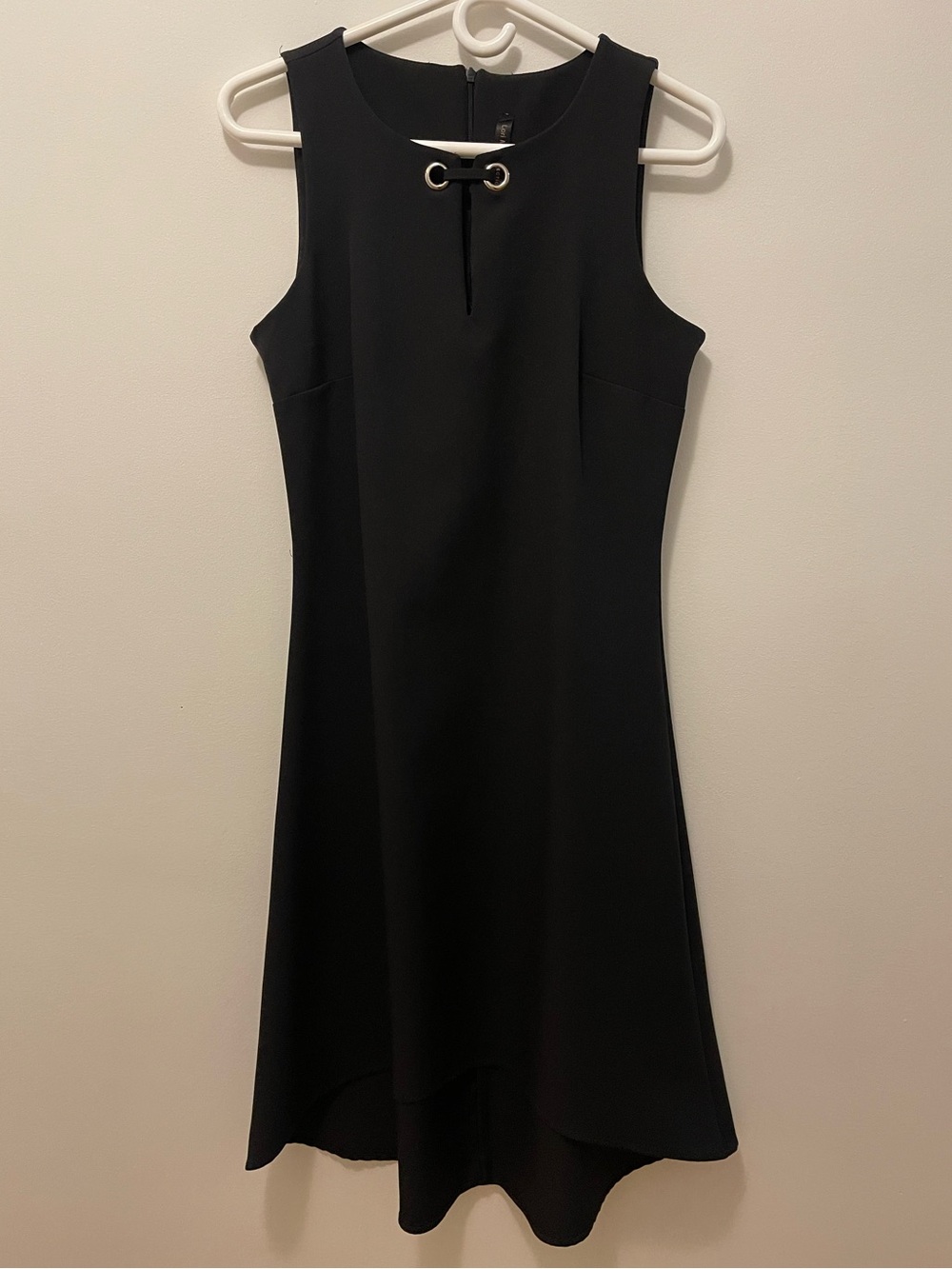 Classic Black Sleeveless High-Low Dress with Grommet Detail